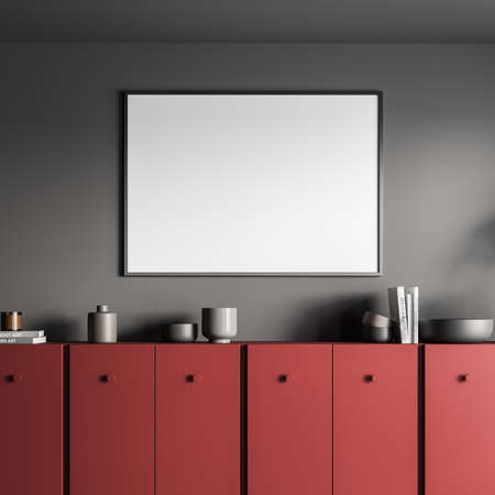Horizontal white poster on the gray wall and the red sideboard in the modern living room. The on...