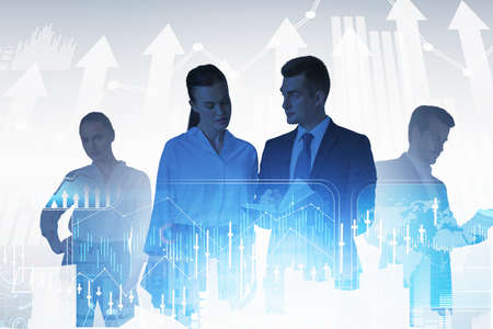 Group of business people work together discussing new strategy. New York city skyscrapers in...