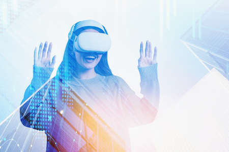 Businesswoman in green sweater is wearing vr helmet. Digital interface with geometrical figures and...