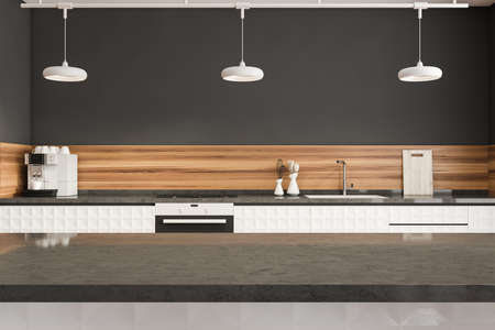 Stylish kitchen interior with wood splashback, dark gray countertops with the wall, the lack of upper cabinets and three white ceiling lamps. A concept of a modern apartment. 3d renderingの写真素材