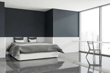 Interior design of trendy bedroom in blue and gray shades. Concrete floor, comfortable bed and table...