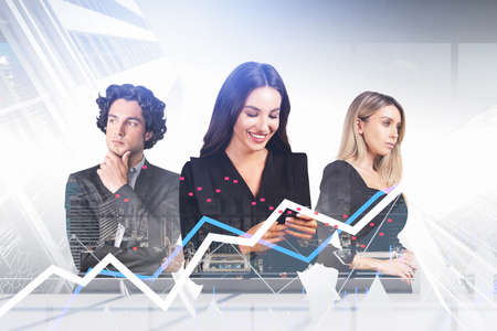 Double exposure of three young business people working together and pondering about new business project. Stock exchange rates, forecasting and financial charts. New York city on background.の写真素材