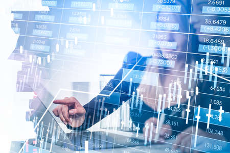 Businesswoman finger point at hud, virtual screen with stock market changes, business bar chart and...