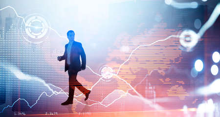 Businessman wearing formal suit is walking. Singapore and New York city skyscraper in the background. Digital interface with circle hologram and virtual map in the foreground. Concept of tradingの写真素材
