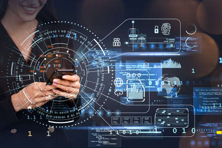 Businesswoman wearing formal suit is typing message on smartphone. Digital interface with virtual...