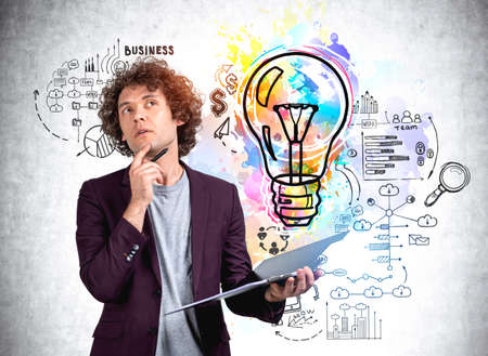 Office man in suit thinking, holding a business papers, big lightbulb drawing with circuit of...