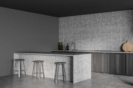Dark gray minimalist kitchen interior with breakfast bar, wood materials and concrete floor. Concept of modern design. Corner view. 3d renderingの写真素材