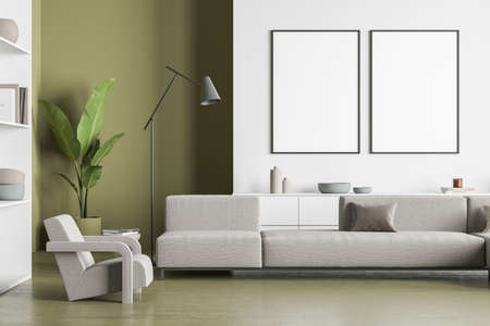 Two empty canvases on wall in white and olive living room interior with sofa, armchair and floor...