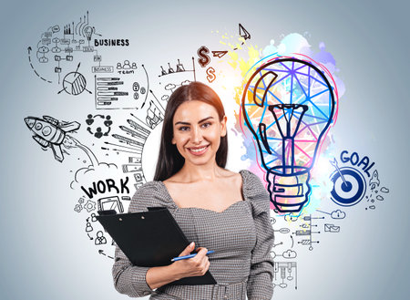 Office woman happy look with documents in hands. Colorful sketch plan with light bulb, doodle of graphs, financial analysis and network communication. Concept of goal and product launchの写真素材