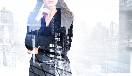 Office woman think, finger to cheek, manager in business suit, double exposure with city view and office buildings. Concept of career development and choiceの写真素材