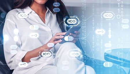 Office woman fingers touching phone screen. Initial coin offering hologram with lines, glowing...
