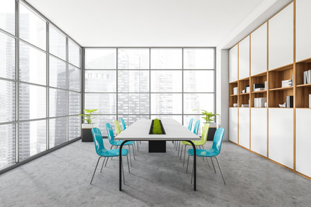 White guest room interior with colorful chairs and plant, side view. Office minimalist coworking space, shelf with decoration, panoramic window with city view, 3D renderingの写真素材