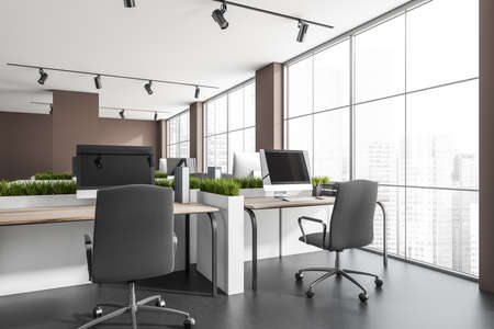 Dark office room interior with panoramic window with city view, desk, six desktops, armchairs and concrete floor. Perfect place for working process. Minimalist design. 3d renderingの写真素材