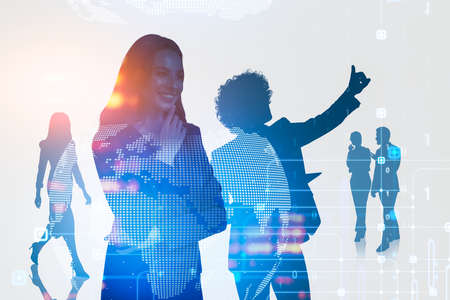 Group of silhouettes business people work together talking and discussing job. Hologram of virtual globe in the foreground. Concept of teamwork of colleagues in international companyの写真素材