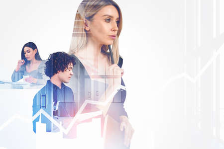 Pondering young handsome businessman wearing jeans shirt work together with businesswomen. Office workplace with smartphone and notebook in the background. Concept of teamwork and cooperationの写真素材