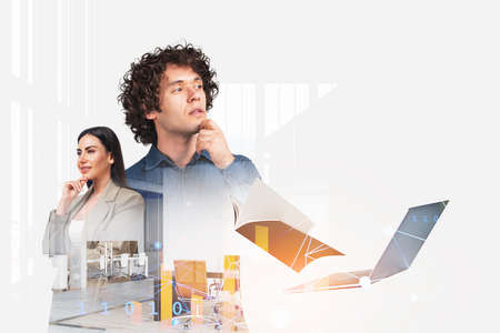 Pondering young handsome businessman wearing jeans shirt work together with businesswoman. Office...