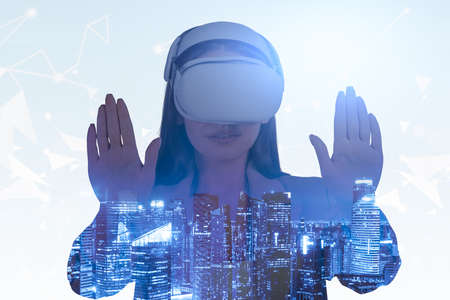 Businesswoman in formal wear is wearing vr helmet. Digital interface with geometrical figures and...