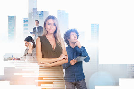 Office woman looking at the camera, arms crossed, people with device and notebook, business skyscrapers. Financial bar chart hologram. Concept of network in companyの写真素材