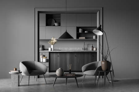 Cooking interior with two seats and coffee table with decoration, gray concrete floor. Dark kitchen...