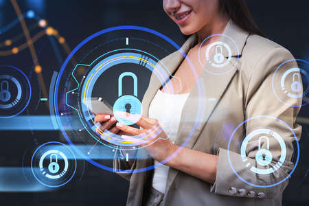 Office woman hands using digital device, smiling. Digital padlock icons and binary, double exposure. Connection and data storage. Concept of safety and authorizationの写真素材