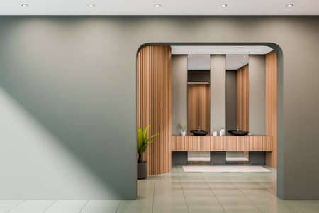 Dark bathroom interior with empty green wall, two mirrors and sinks, arch, concrete tile floor,...