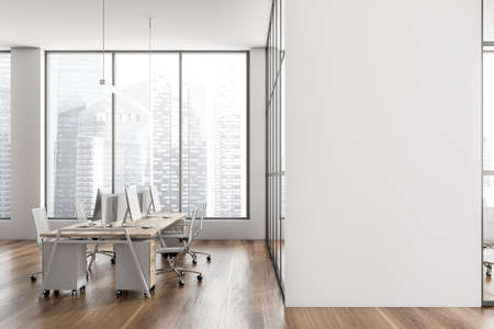 Light coworking room interior with armchairs and desktop pc on table, side view, hardwood floor. Window with  city view. Copy space white wall, 3D renderingの写真素材