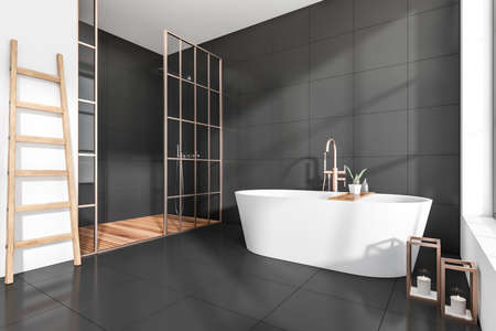 Dark bathroom interior with white tub and shower, tiled floor. Towel rail ladder and candles. Side view of the washing room in the hotel. Copy space tiled wall, 3D renderingの写真素材