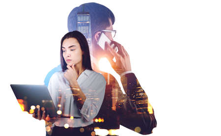 Businessman and businesswoman using laptop and smartphone, pensive look and call. Double exposure...