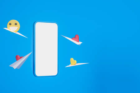 Phone blank display and flying letters, paper airplanes with heart, emoji icons. Concept of social media and mobile app. Mockup copy space screen. 3D renderingの写真素材