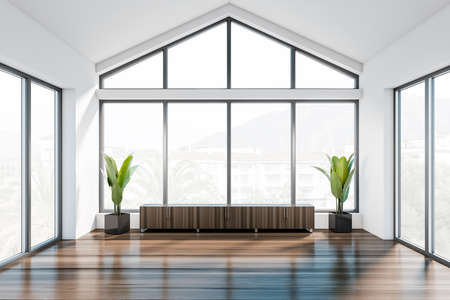 Front view on office room interior with empty space for creative idea, panoramic windows with town view and wooden floor. Concept of place for working process and meeting. 3d renderingの写真素材