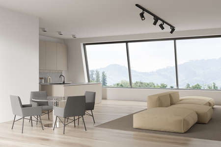 Corner view on bright studio room interior with dining table with chairs, panoramic window,...