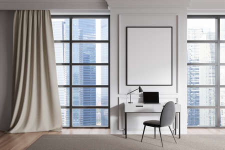 Home office interior with laptop on desk and armchair, panoramic window on Singapore city view, carpet on hardwood floor. Mock up canvas poster, 3D renderingの写真素材