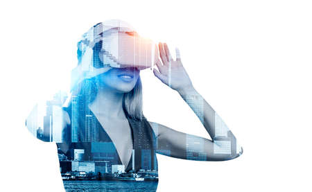 Businesswoman silhouette in vr headset, skyscrapers toned image. Circuit of connection and cyberspace. Concept of alternate reality and future technologyの写真素材