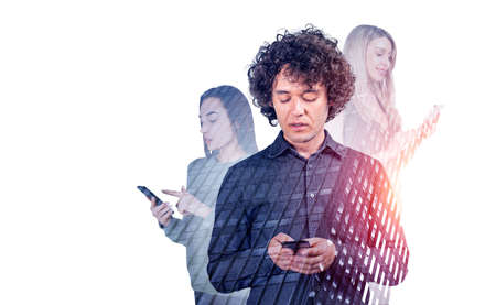 Group of business people wearing casual and formal wear works together on smartphones. city skyscrapers. Concept of teamwork, cooperation, internet communication, distance work and coworkingの写真素材
