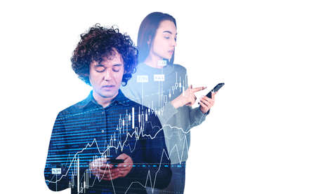 Businessman and businesswoman wearing casual wear work together on smartphones. Forex candle stick,...
