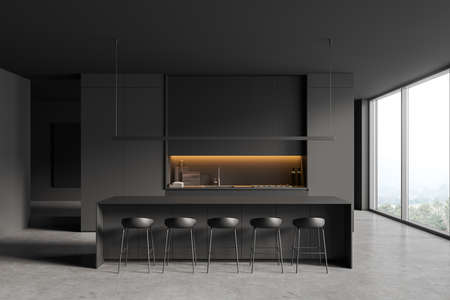 Dark kitchen interior with bar chairs and countertop, gray concrete floor. Kitchenware on shelf with backlight. Dining area with panoramic window on countryside. 3D renderingの写真素材