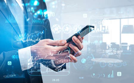 Businessman using smartphone, mobile app for broker. Glowing hud with forex diagrams, digital data...