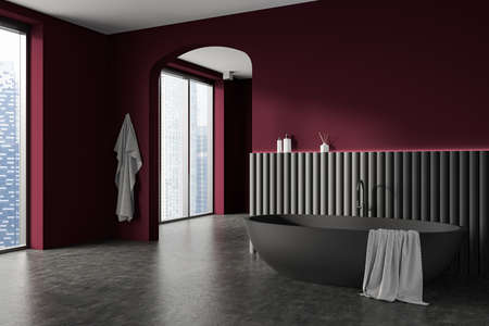 Hotel bathroom interior with tub and deck with accessories, side view, panoramic window on Singapore...