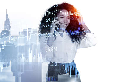 Black businesswoman smiling and talking on the phone, double exposure hud with forex diagrams. Stock...