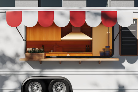 Modern food truck with kitchen, cooking area and kitchenware. concept of city food. 3D renderingの写真素材