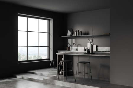 Corner view on dark kitchen room interior with cupboard, island, barstool, gray wall, concrete floor, panoramic window, shelves, gas cooker. Concept of minimalist design. 3d renderingの写真素材