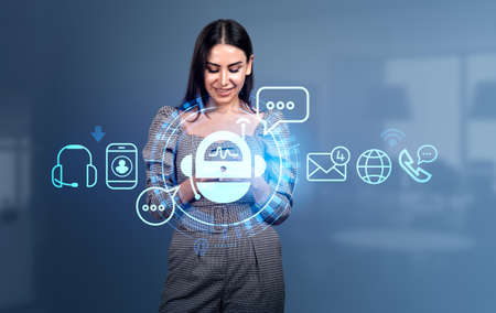 Businesswoman is holding smartphone with digital interface with various holograms. Robot, smart...