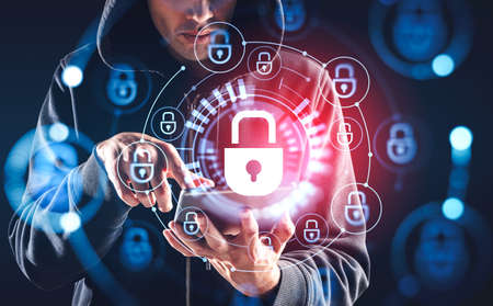 Man hacker finger touch tablet in hand, glowing lock circuit. Concept of cyberattack and protection