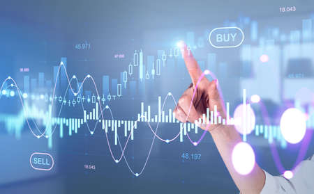 Businesswoman finger touch stock market diagrams, hologram with lines and candlesticks on virtual...