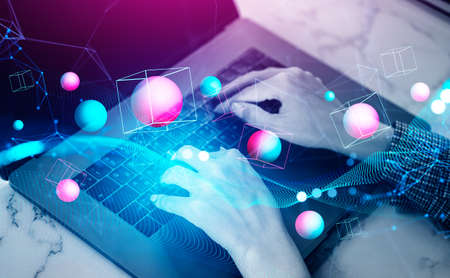 Top view of businesswoman fingers typing on laptop, double exposure, digital hologram of spheres and...