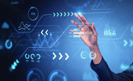 Black businessman finger touch glowing digital analysis hud, virtual screen with big data graphs, arrows with numbers. Concept of research and developmentの写真素材