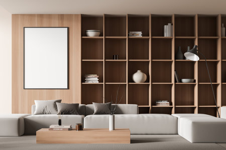 Cozy living room interior with sofa, coffee table and wooden shelf with decoration, carpet on gray concrete floor. Mock up canvas poster. 3D renderingの写真素材