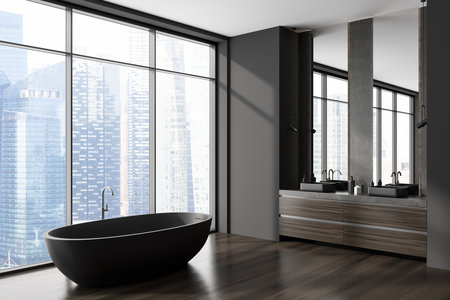 Dark bathroom interior with double sink and mirror, side view, bathtub on hardwood floor. Panoramic window on skyscrapers. 3D renderingの写真素材