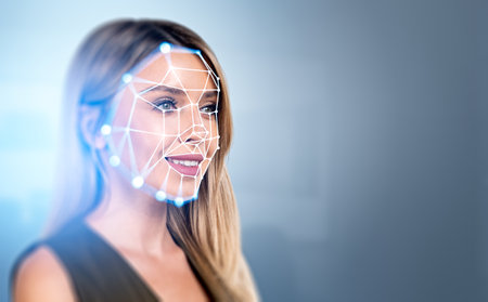 Smiling businesswoman portrait and digital biometric scanning hologram, face detection and recognition. Concept of face id and artificial intelligence. copy spaceの写真素材