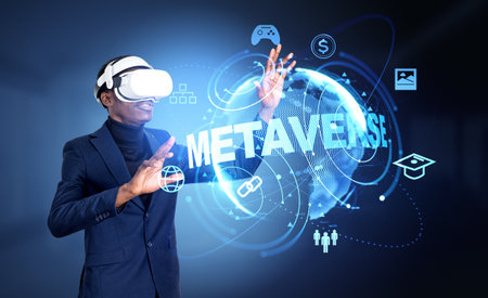 Black businessman in vr glasses headset, hands touching glowing earth sphere hud, metaverse hologram with web icons. Concept of futuristic technologyの写真素材